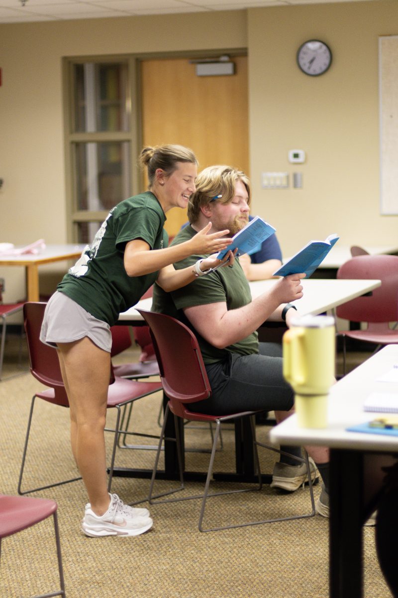 Second-years Lucia Draine and Milo Olinger rehearse for "You Can’t Take It with You." Photo by Kyle Buehrer.  