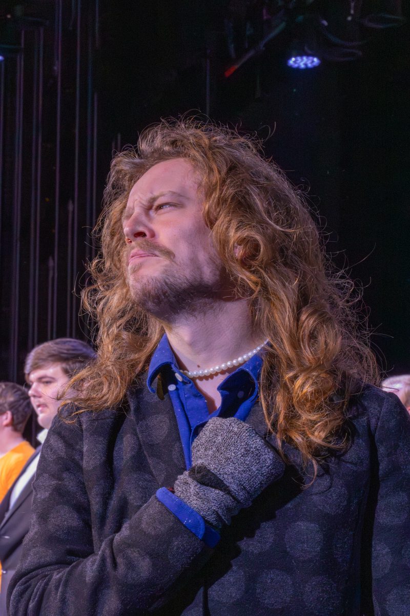 Fourth-year Jobey Olson during the Ritterchor performance of Man or Muppet