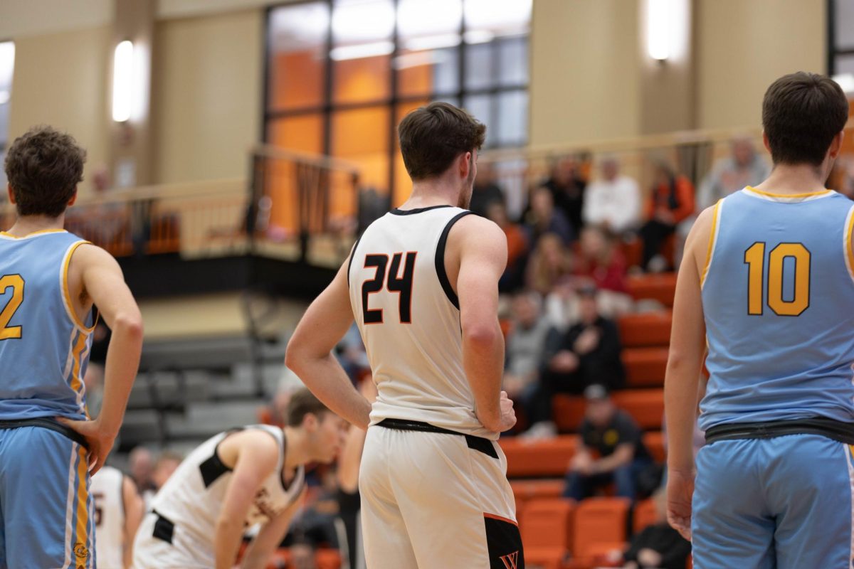 Junior Ethan Yungtum stands around the paint while waiting for his teammate to shoot free throws against Buena Vista University on Jan. 14.