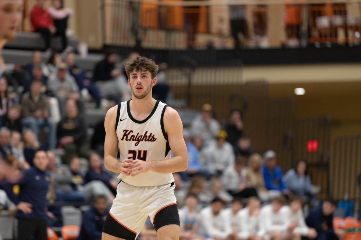 Junior Ethan Yungtum awaits a pass during a play while facing Buena Vista University on Jan. 14.