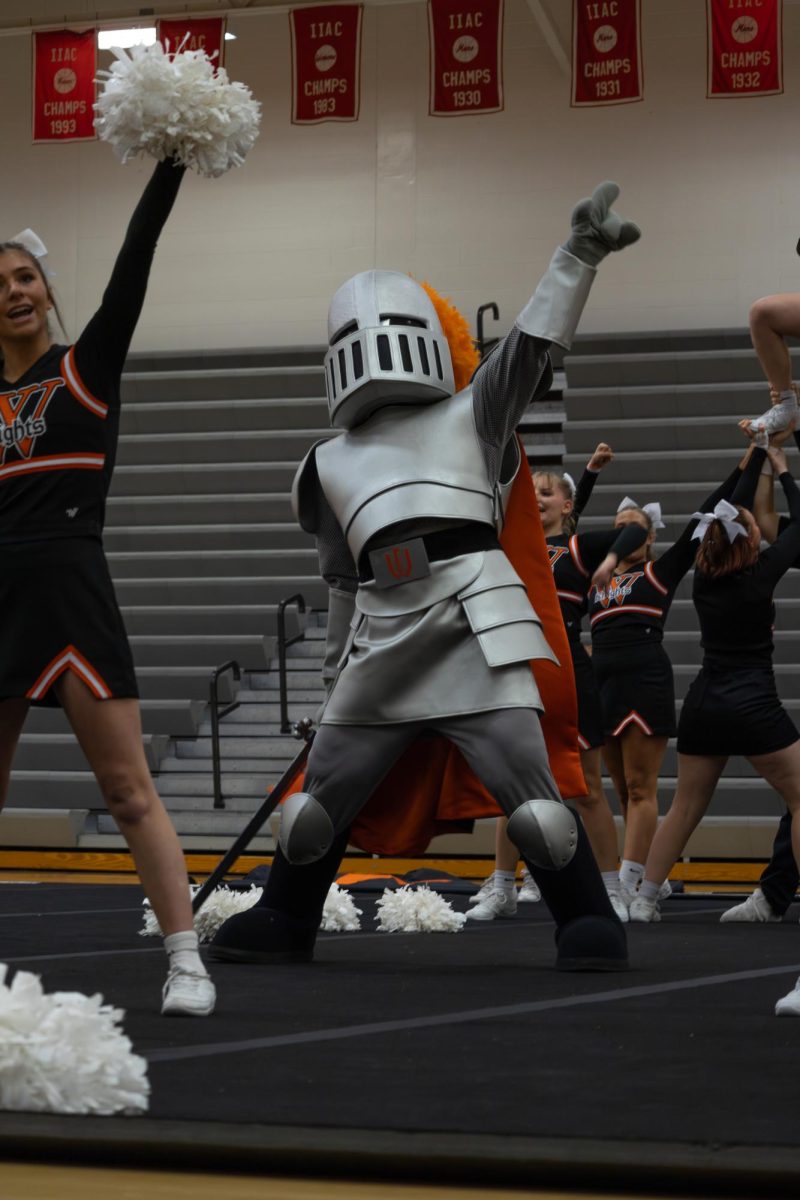 Sir Victor dancing alongside Wartburg cheer and dance members.