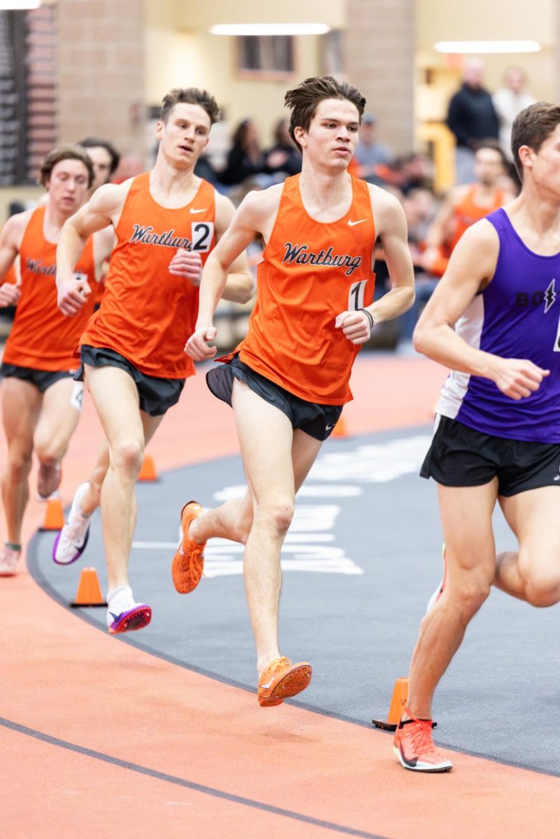 Junior Isaiah Hammerand leads the Wartburg crew around the curve during a race at the Chelsey Henkenius Open on Jan. 17.
