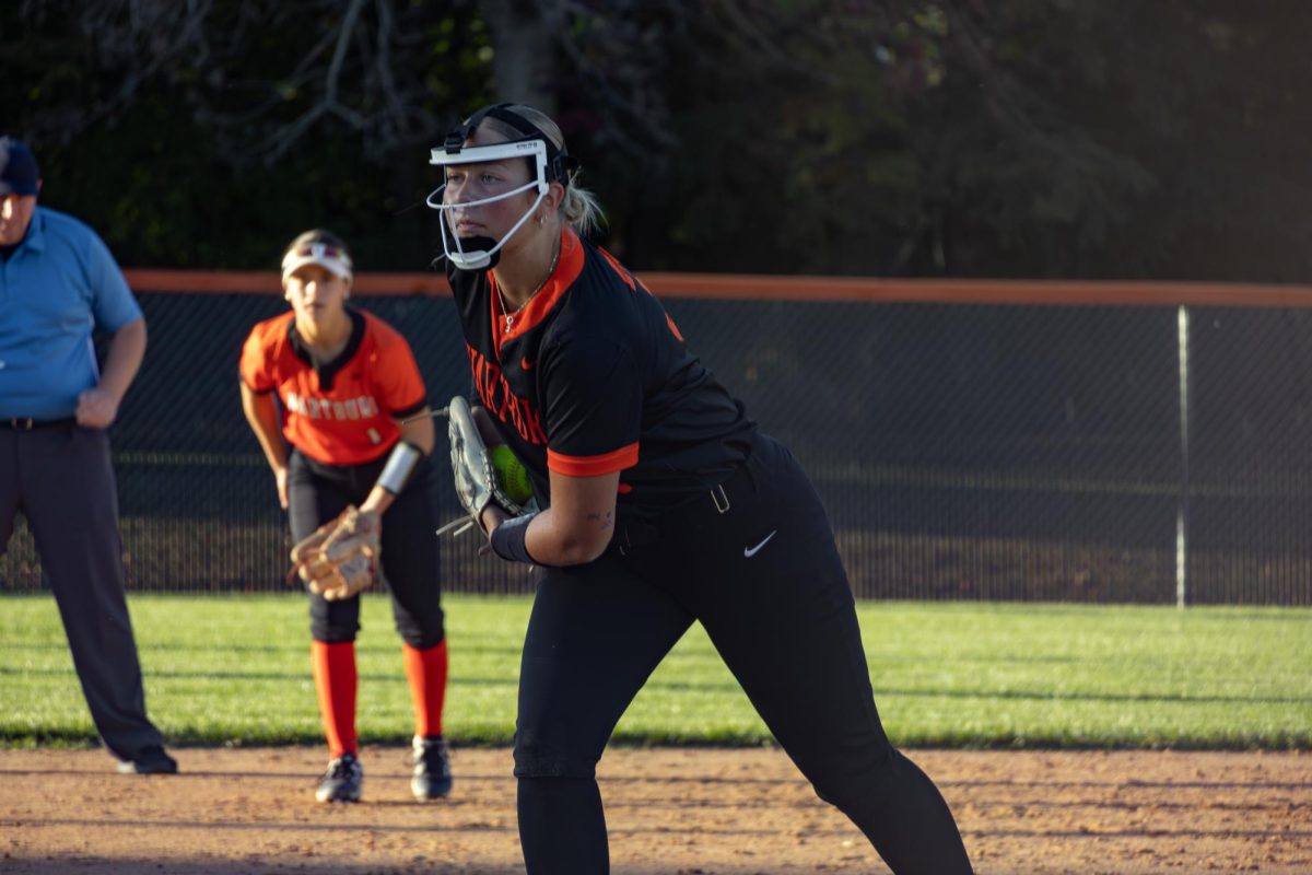 Junior Jillian Panther prepares a pitch during a scrimmage in October 2025.