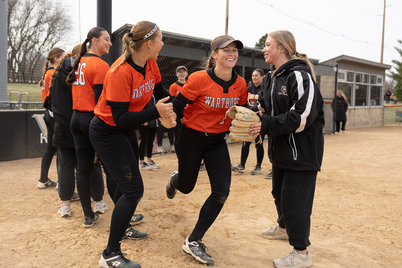 Senior Ally Happ leaves the circle during the starting lineup before the first game of the double-header night. 